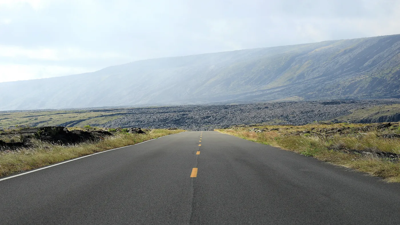 Chain of Craters Road crossing black lava fields down toward the coast
